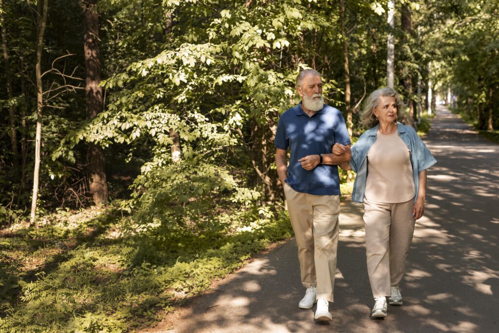 full-shot-senior-couple-walking-together