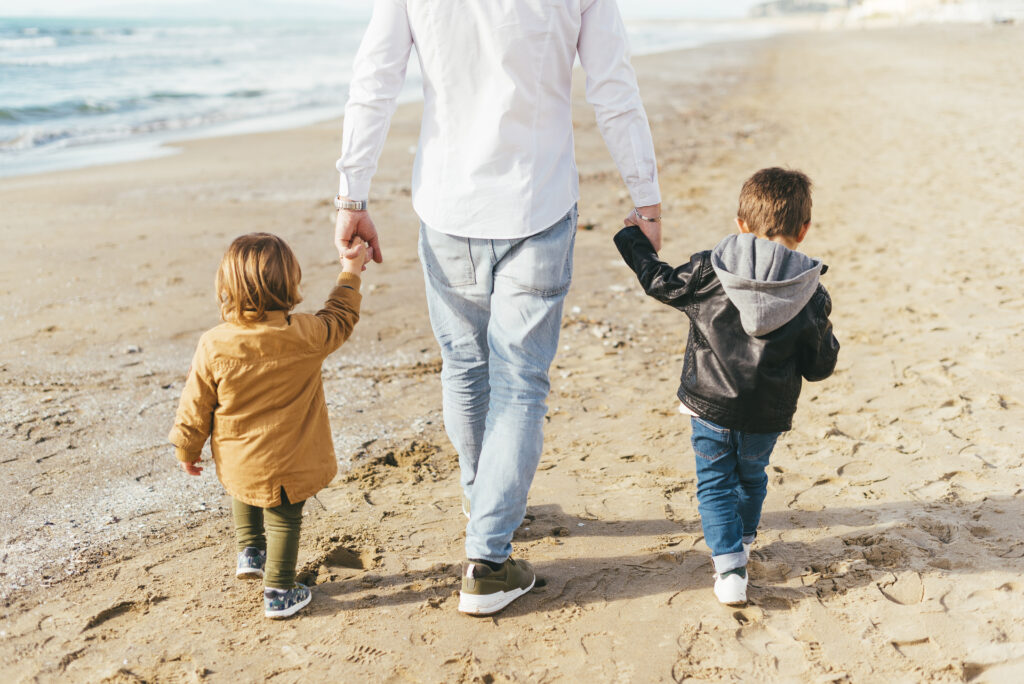 children-walking-beach-with-dad-beach-agadir