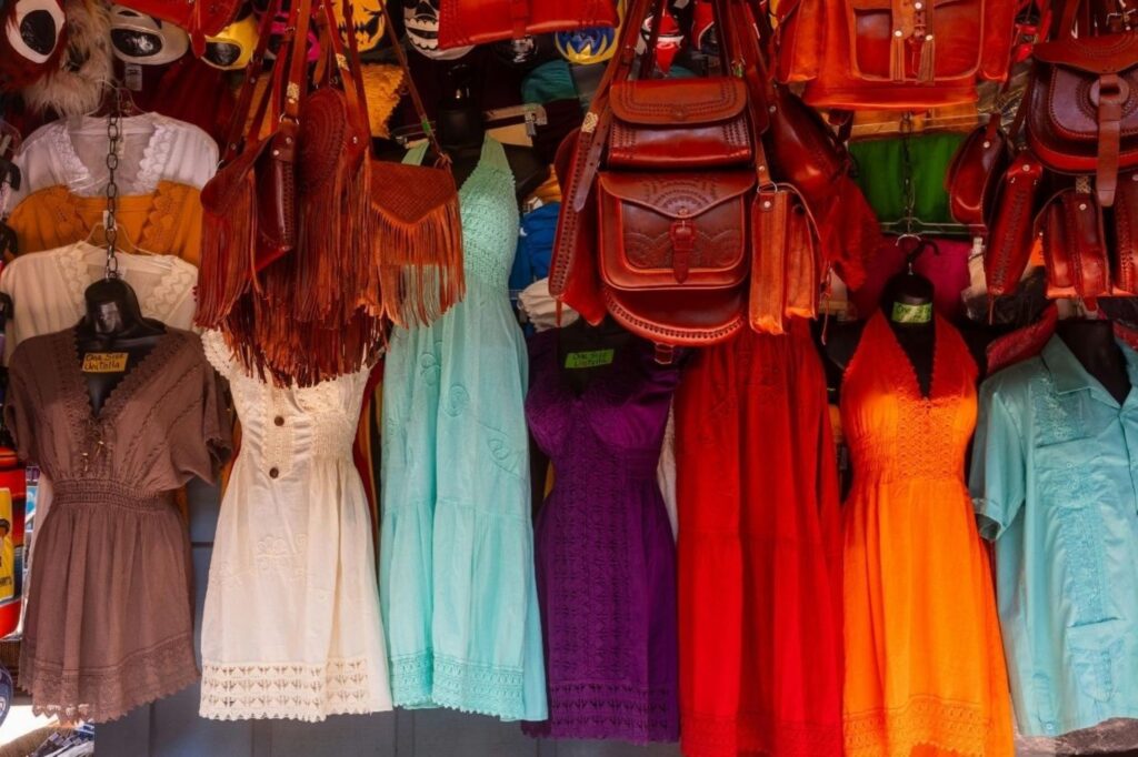 Elegant slow fashion dress featuring Moroccan embroidery and artisanal details, representing sustainable luxury fashion crafted by skilled artisans in Morocco