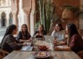 Moroccan female founders discussing innovation strategies at a startup meeting in Marrakech, showcasing entrepreneurial women driving Morocco's tech scene growth