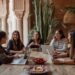 Moroccan female founders discussing innovation strategies at a startup meeting in Marrakech, showcasing entrepreneurial women driving Morocco's tech scene growth