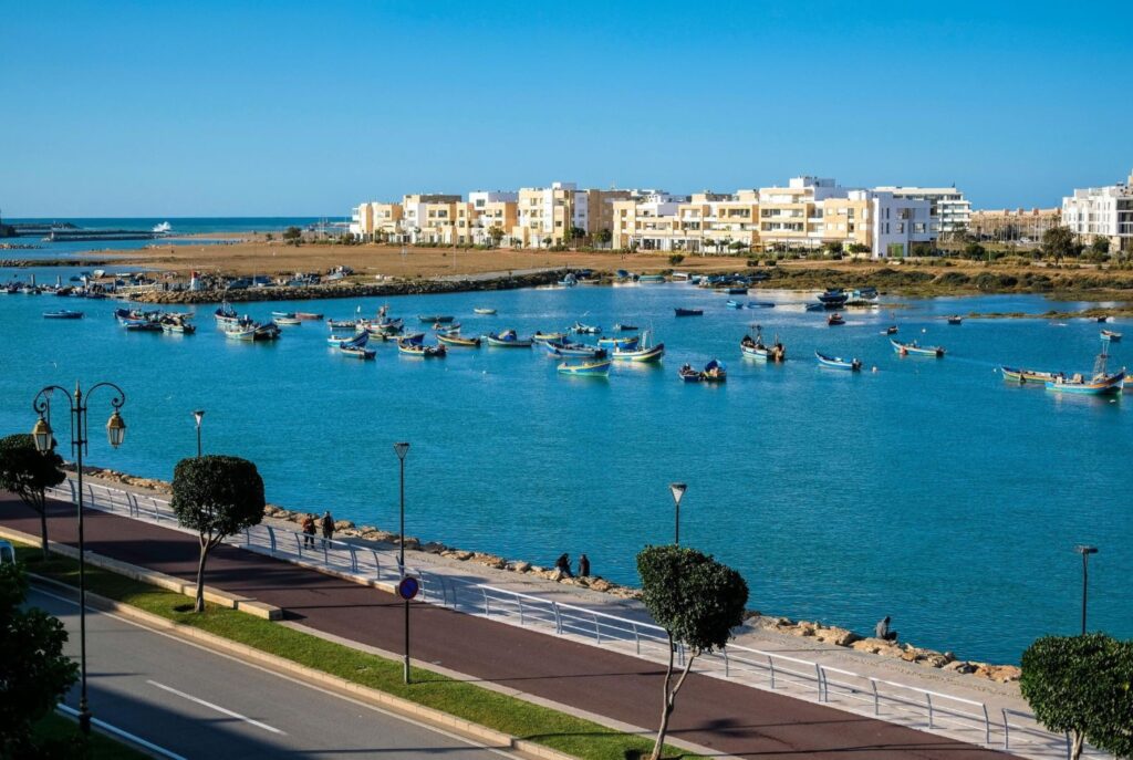 Traditional fishing village with colorful boats Morocco coast coastal gems beach Atlantic hidden