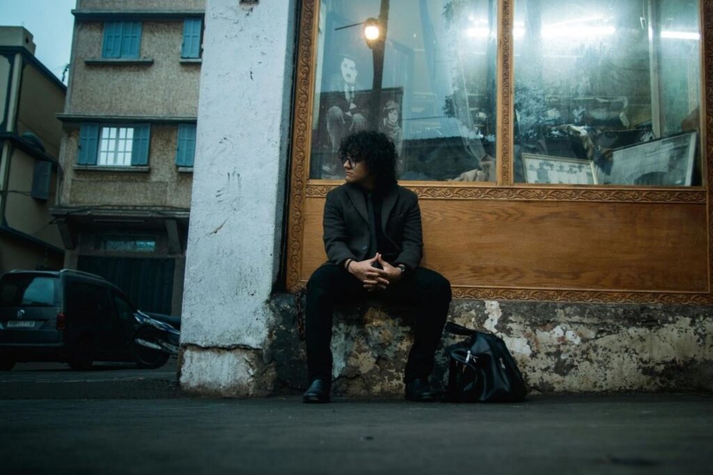 Urban Casablanca street scene representing Moroccan cinema's social realism aesthetic chronicling youth culture, postcolonial identity, and contemporary society through acclaimed directors like Nabil Ayouch