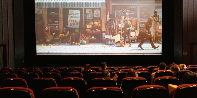 Moroccan audience watching contemporary film in cinema theater representing Moroccan cinema evolution through domestic productions, celebrating North African storytelling reaching local and international viewers during winter 2025 festival season