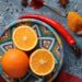 Traditional Moroccan spiced oranges arranged on decorative plate during citrus season, featuring fresh Navel oranges with cinnamon and orange blossom water for authentic dessert recipes