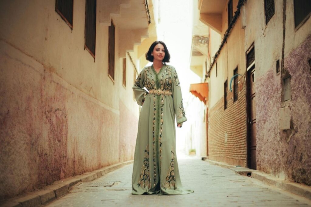 Scene from Maryam Touzani's The Blue Caftan representing contemporary Moroccan cinema exploring identity and craftsmanship through Oscar-nominated film available for winter 2025 streaming