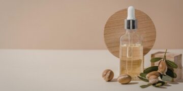 Argan oil beauty benefits with Moroccan liquid gold in authentic cosmetic bottle for skincare