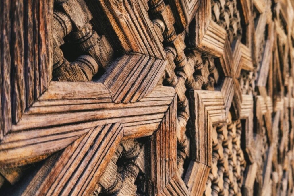 Moroccan doors restoration showing traditional woodwork carving detail and historic geometric patterns