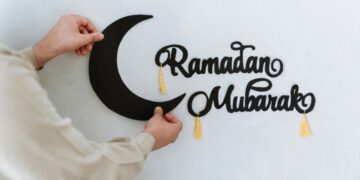 Moroccan preparing Ramadan with traditional mosque decorations and spiritual planning atmosphere