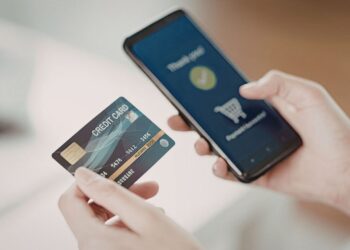Fintech apps in Morocco showing mobile banking on smartphone with digital payment and financial technology
