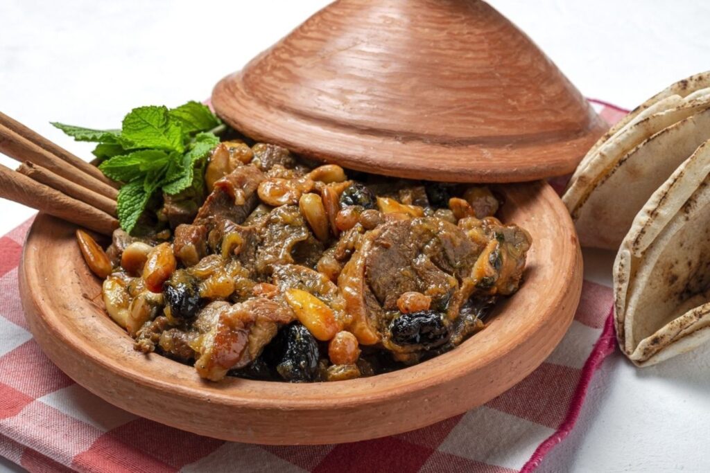 Traditional Moroccan lamb dishes prepared during Eid al-Adha Morocco including grilled kofta and slow-cooked tagine
