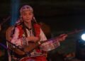 A female Amazigh musician performs on stage at the Timitar Festival in Agadir, Morocco