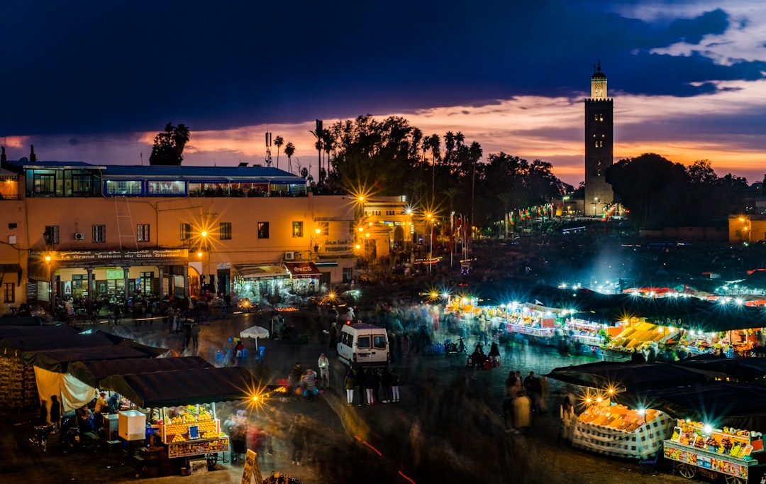 A large crowd gathers under the night sky at the Timitar Festival open-air venue in Agadir