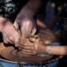 pottery-workshop-unsplash - MAwebzine A mother and child shape clay together during a Morocco holiday craft workshop in a traditional Fes pottery studio
