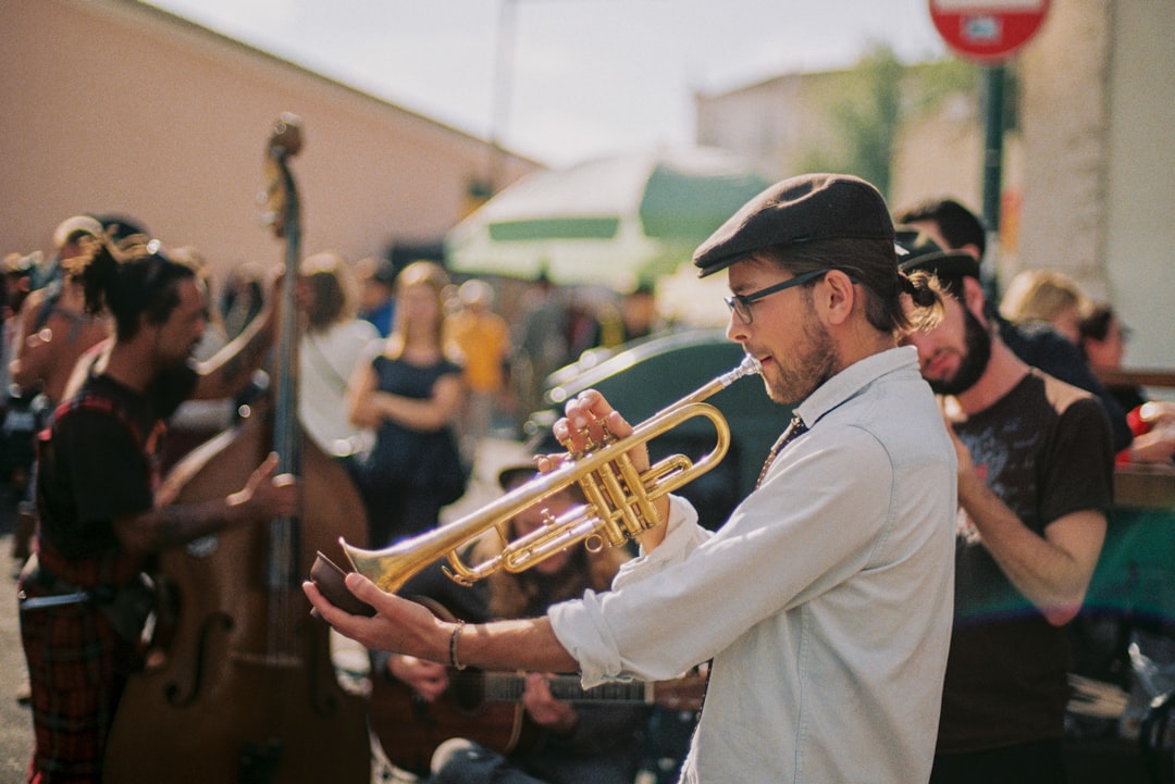 Musicians performing at an outdoor concert stage during the Asilah Moussem on Morocco's Atlantic coast