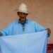 A Moroccan artisan weaving fabric inside a cooperative, showing the process behind building a capsule wardrobe