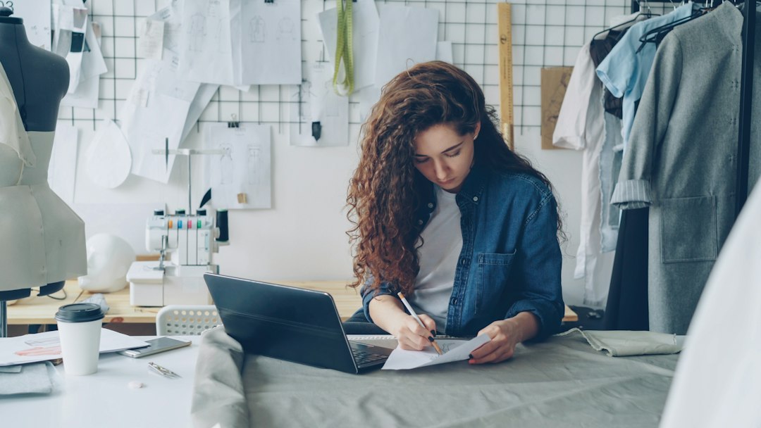 Young entrepreneur reviewing freelance status requirements and tax thresholds